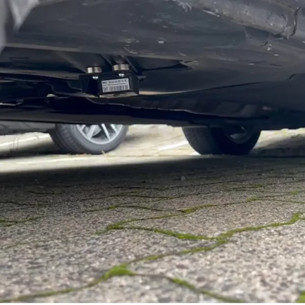 VLITEX Temperature Tracker mounted under a car, ideal for monitoring battery temperatures in electric vehicles.